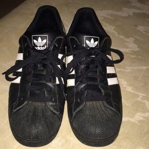 worn adidas black & white size 14 tennis shoe